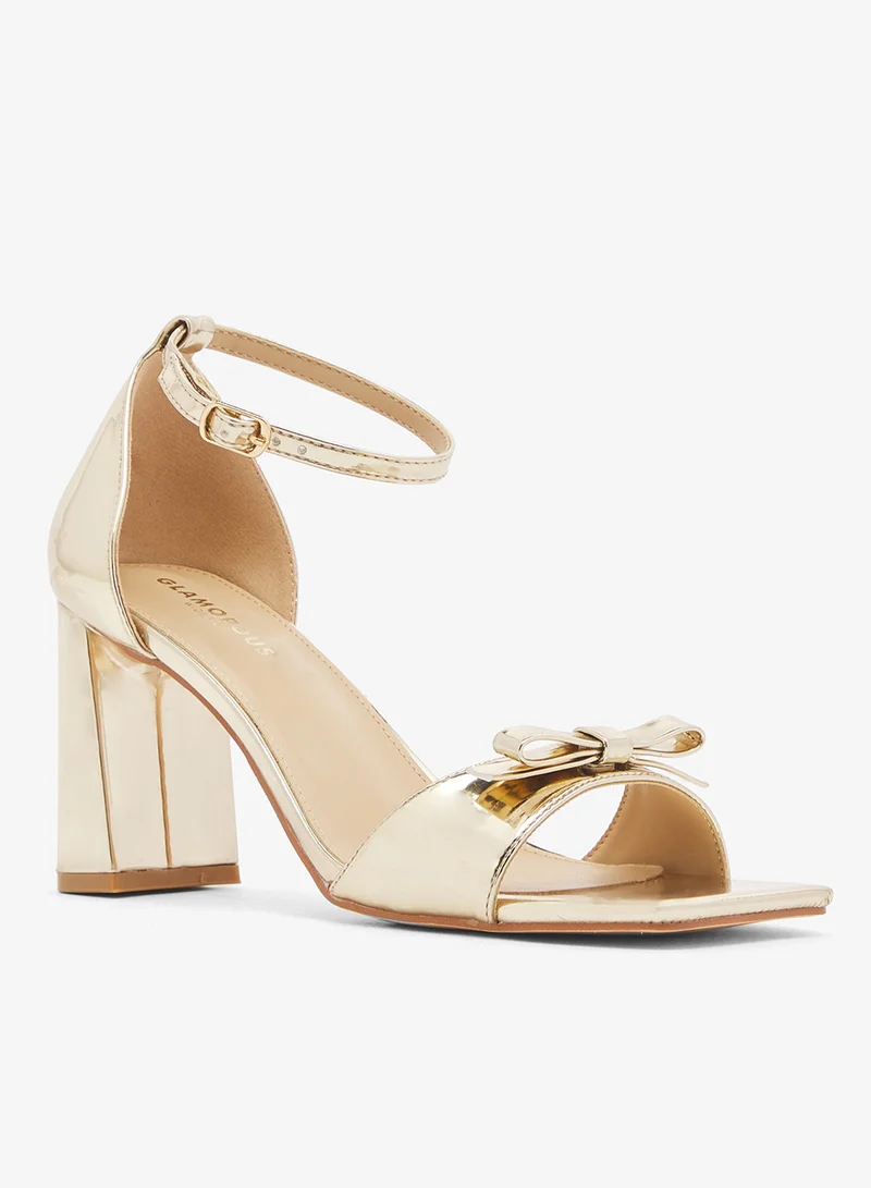 جلاموروس صنادل بكعب عريض منخفض بحزام للكاحل